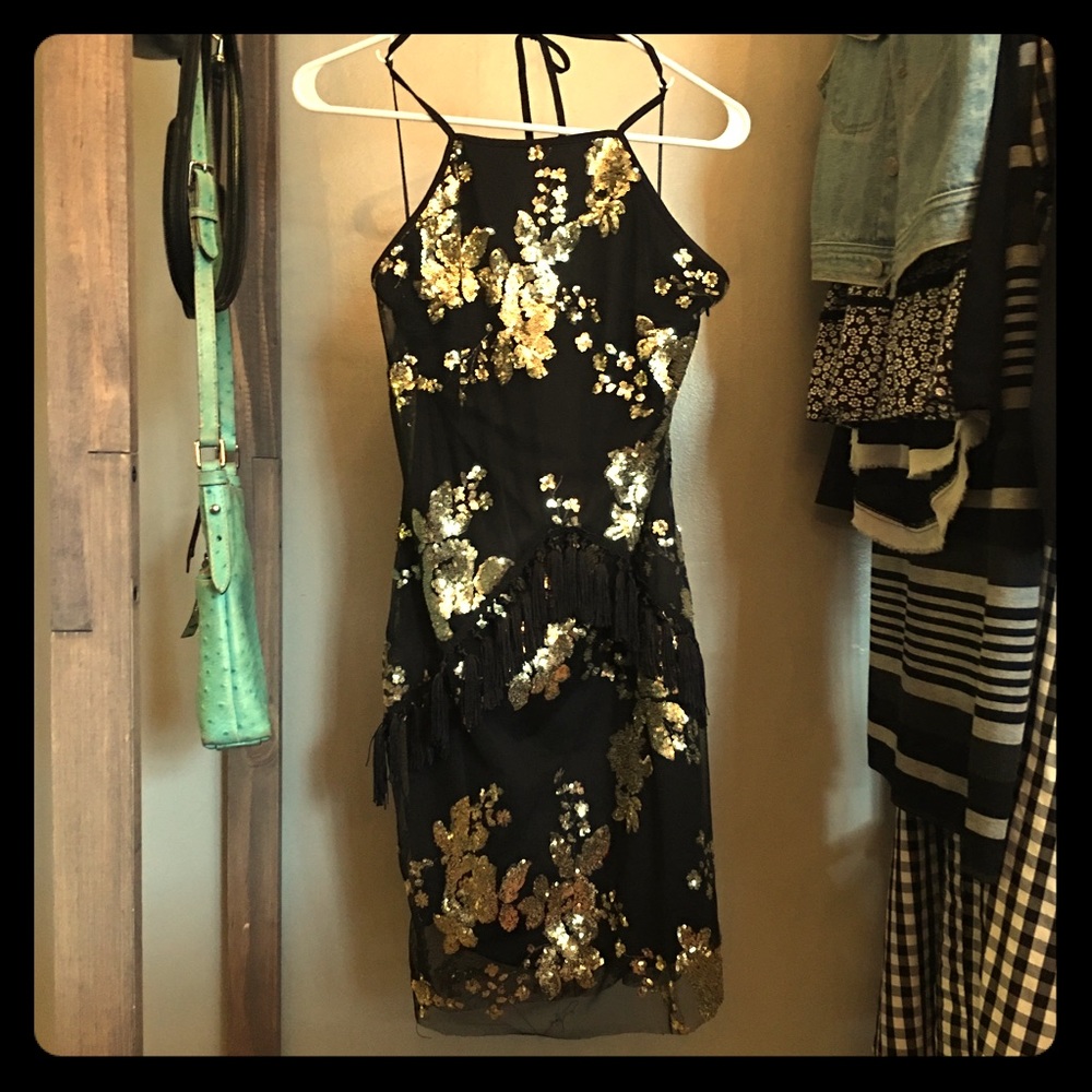 Floral sequin & tassel halter dress.
